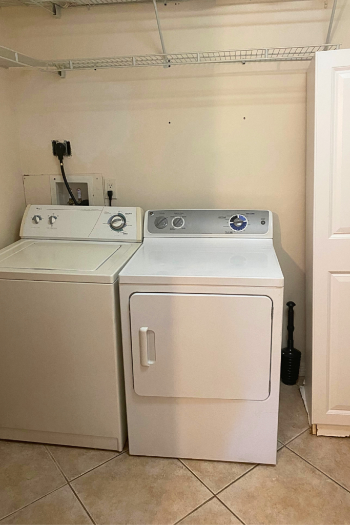 Before the laundry room maokver, old shelves, crocked old cabinet that was falling apart and yellow walls from how long it hasn't been painted.