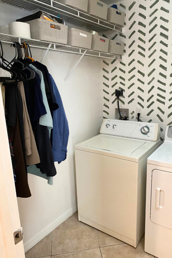 Look after laundry room makeover DIY.Before the floating shelf, pattern finished and baskets added.