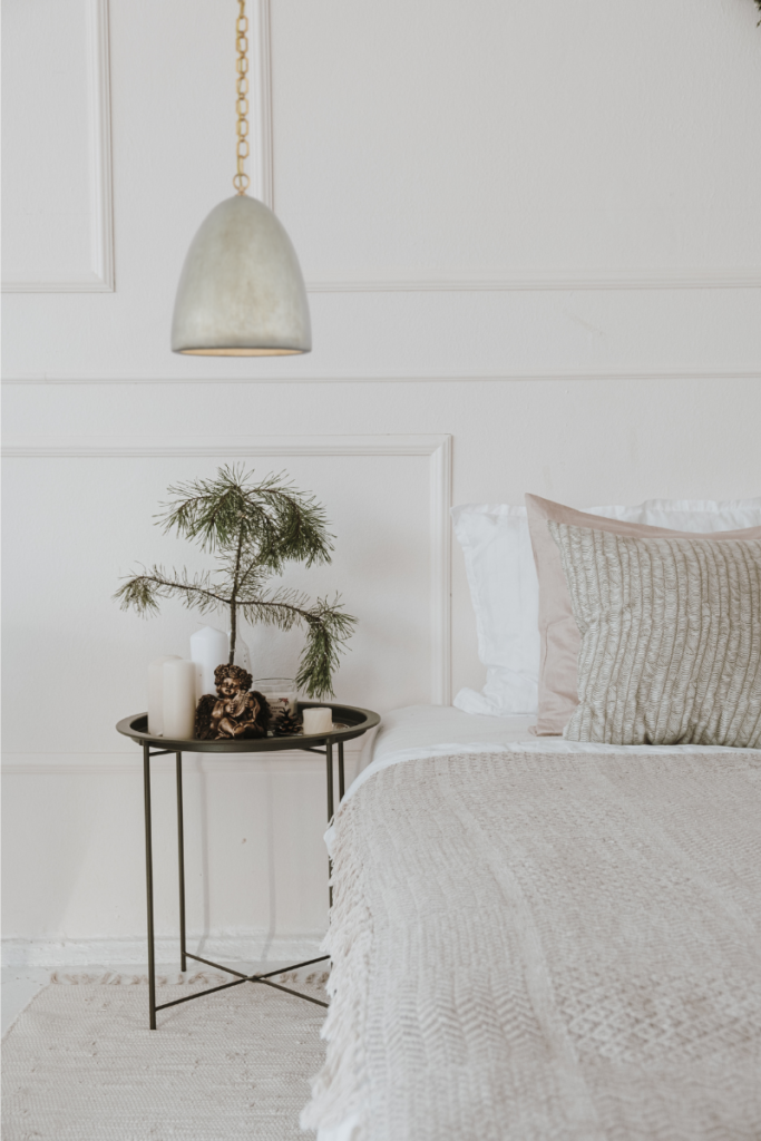 Natural elements such as stone looking pendant over your nightstand gives a natural look to your room and feels welcoming.