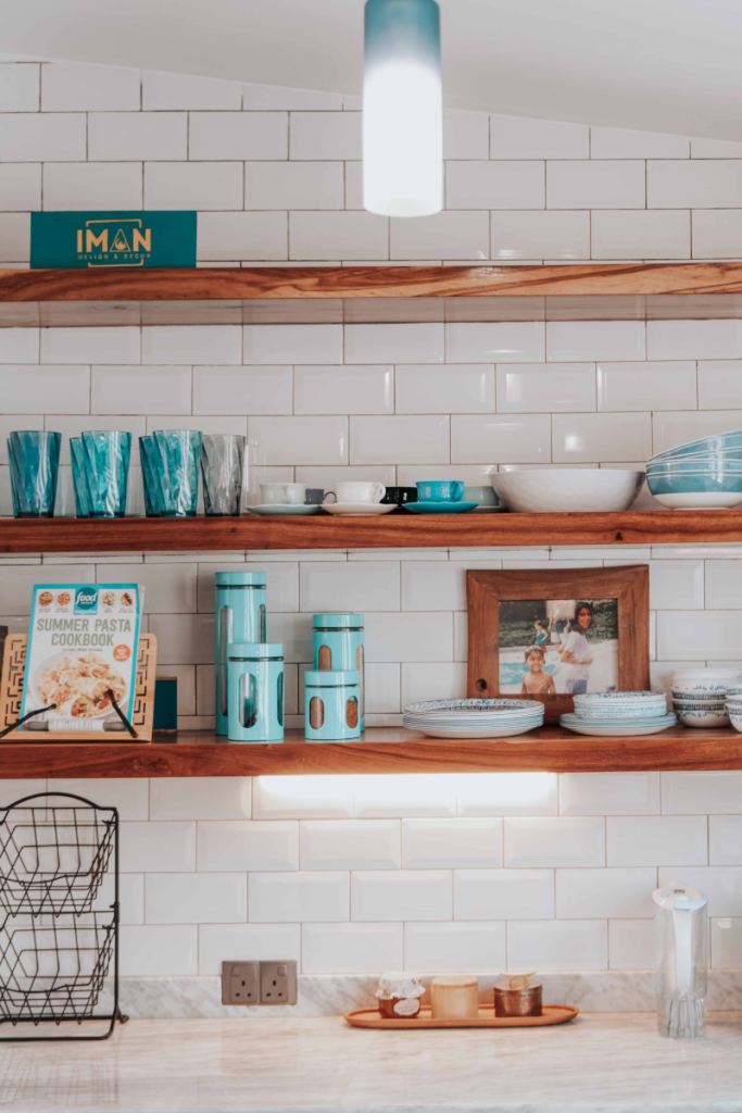 Open shelves used for kitchen items, ca be used in the spaces like living room, bedroom, or even hallway.