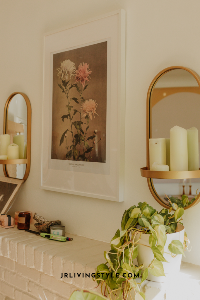 Use different textures and materials to make it cozy and natural: metal mirrors, plant, brick shelf, sage.